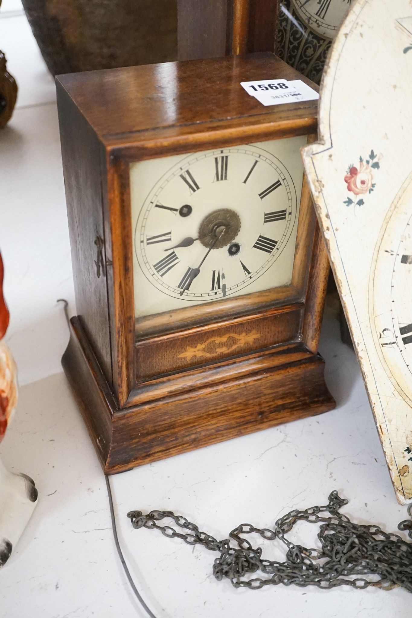 An early 19th century Dutch longcase timepiece movement, a late 29th century American shelf clock and a German mantel clock (3)